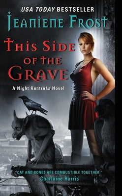 Paperback edition of "This Side of the Grave," a Night Huntress novel by Avon Books, featuring a dark fantasy cover design.