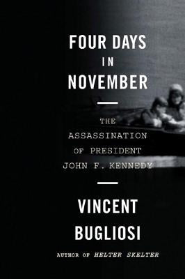 Paperback book "Four Days in November" by W. W. Norton & Company, featuring the assassination of President John F. Kennedy.